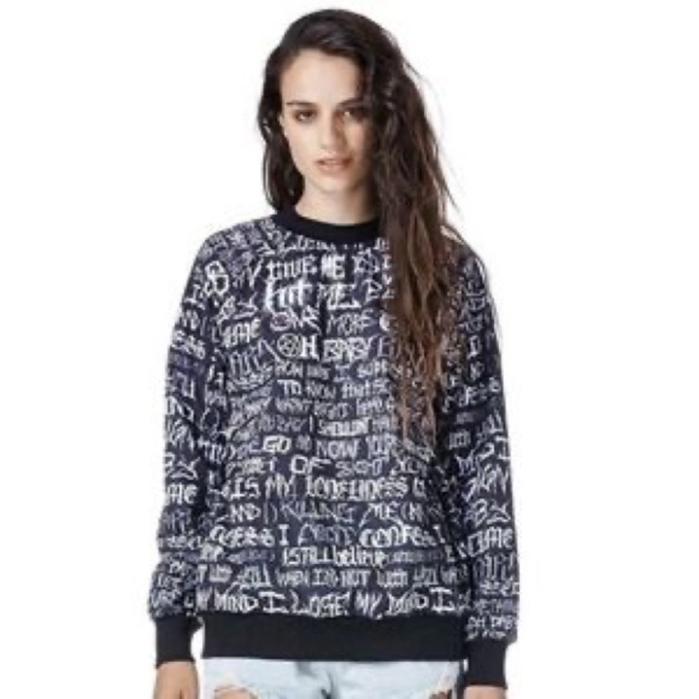 UNIF “brutal” hit me baby one more time sweatshirt
